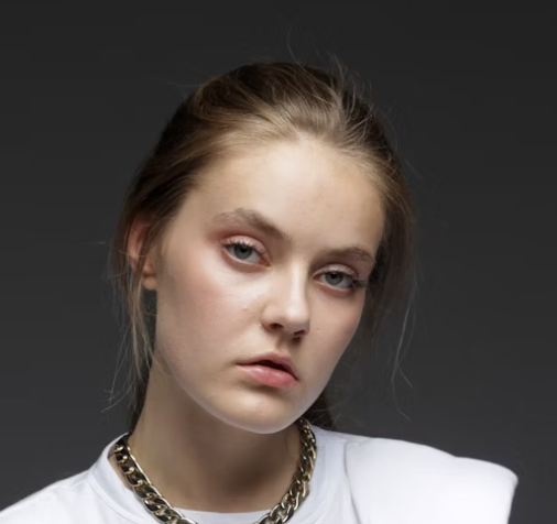 Serious woman studio portrait